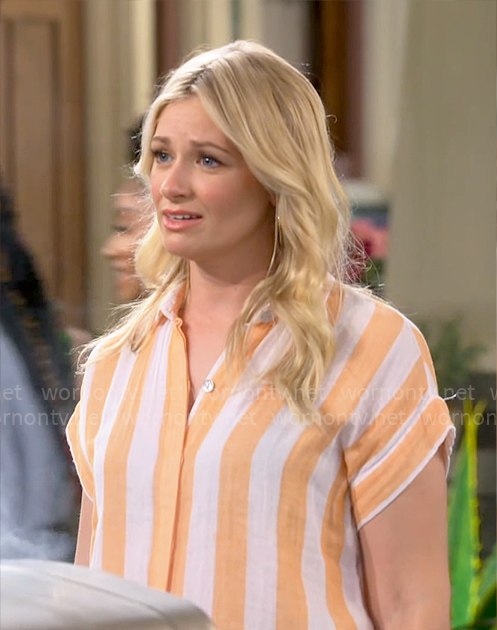 Gemma's orange vertical stripe shirt on The Neighborhood