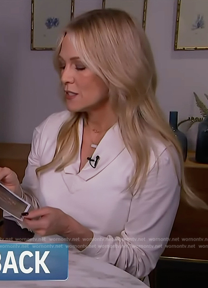 Jennie's white vest and blouse on Access Hollywood