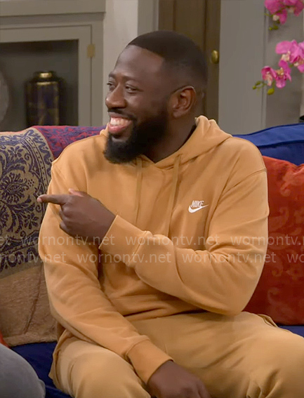 Malcolm's yellow Nike hoodie on The Neighborhood