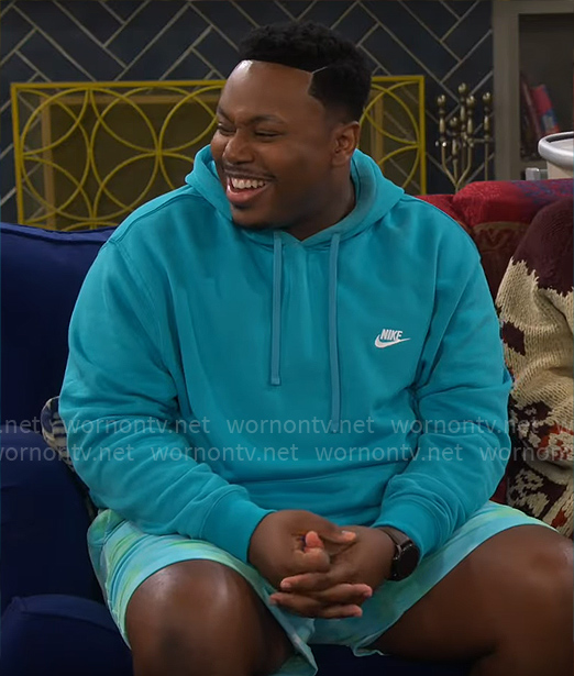 Marty's turquoise blue Nike hoodie on The Neighborhood