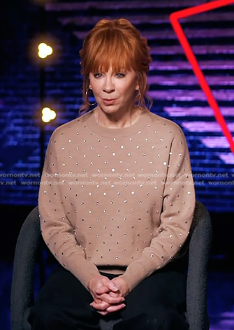 Reba's beige embellished sweatshirt on The Voice