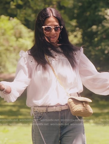 Rebecca's white embroidered blouse and jeans on The Real Housewives of New York City