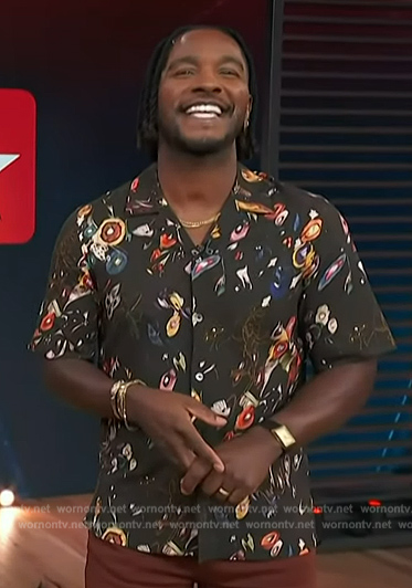 Scott's black floral print shirt on Access Hollywood