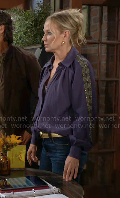 Sharon's navy blouse with embellished sleeves on The Young and the Restless