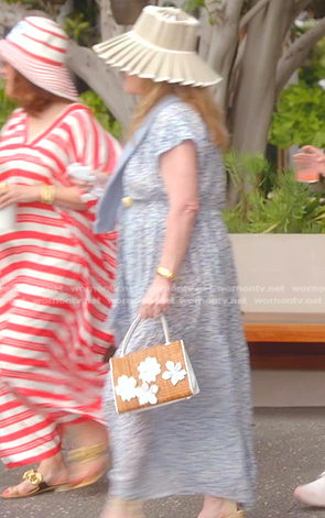 Kathy's white floral straw bag on The Real Housewives of Beverly Hills