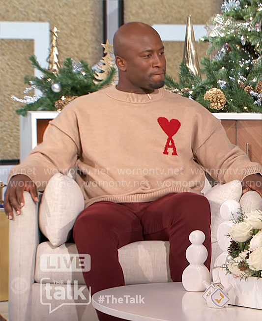 Akbar's camel sweater with heart on The Talk