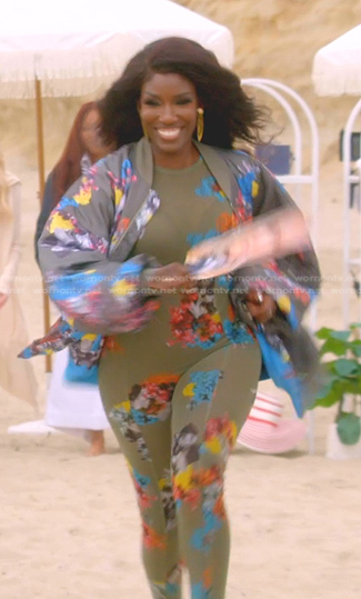 Bozoma's khaki floral jumpsuit and bomber jacket on The Real Housewives of Beverly Hills