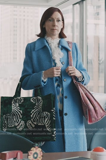 Elsbeth's blue coat and zebra tote on Elsbeth