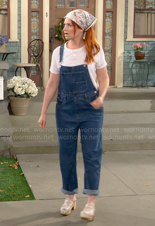 Gemma's denim overalls and lips tee on The Neighborhood