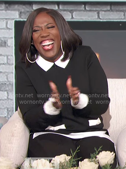 Sheryl's black sweater with contrasting collar on The Talk