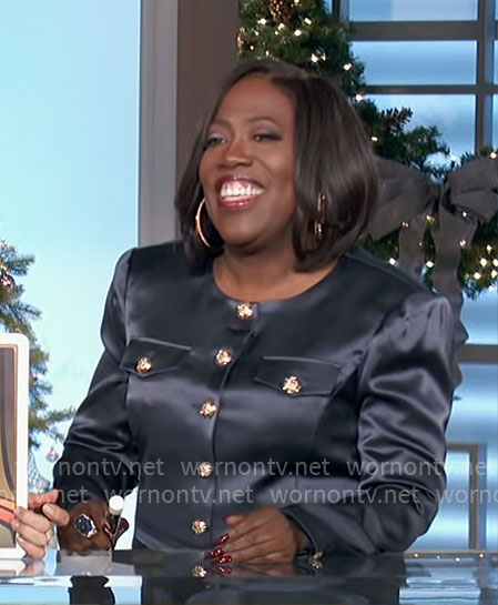 Sheryl's navy satin jacket on The Talk