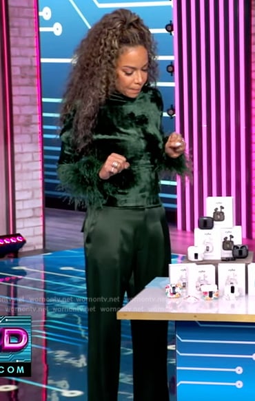 Sunny's green velvet feather cuff top and pants on The View