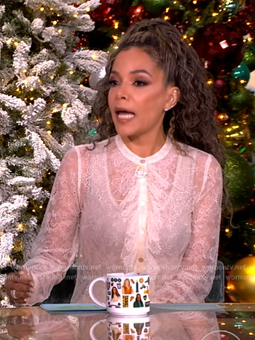 Sunny's white lace ruffle blouse on The View