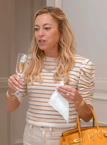 Sutton's striped puff sleeve sweater on The Real Housewives of Beverly Hills