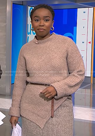 Zinhle's beige asymmetric sweater on NBC News Daily