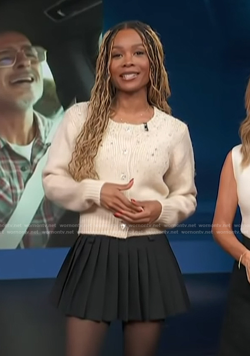 Zuri's embellished beige cardigan on Access Hollywood