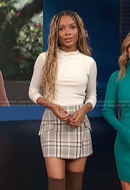 Zuri's plaid mini skirt on Access Hollywood