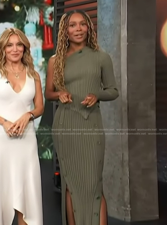 Zuri's green one sleeve asymmetric top and skirt on Access Hollywood