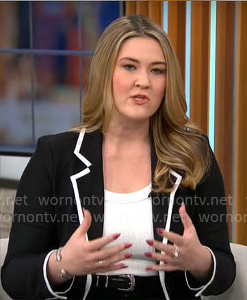 Ashley Sharp's black blazer with white trims on CBS Mornings