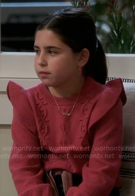 Georgia's pink ruffle-shoulder sweater on Shifting Gears