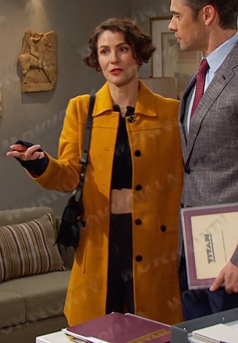 Sarah's orange coat and shoulder bag on Days of our Lives