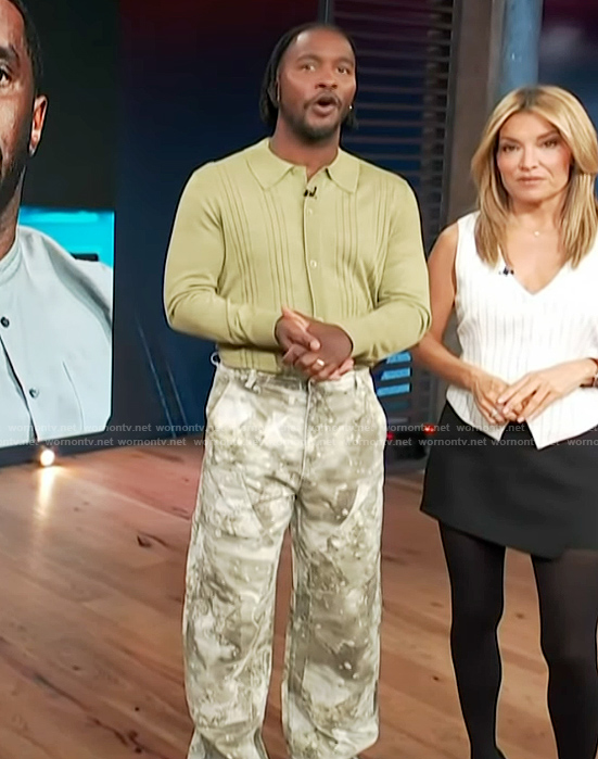 Scott's green knit sweater and camo print pants on Access Hollywood