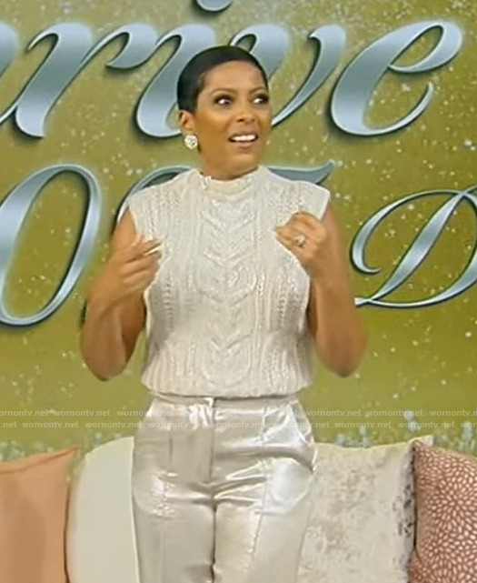 Tamron's white cable knit vest and pants on Tamron Hall Show