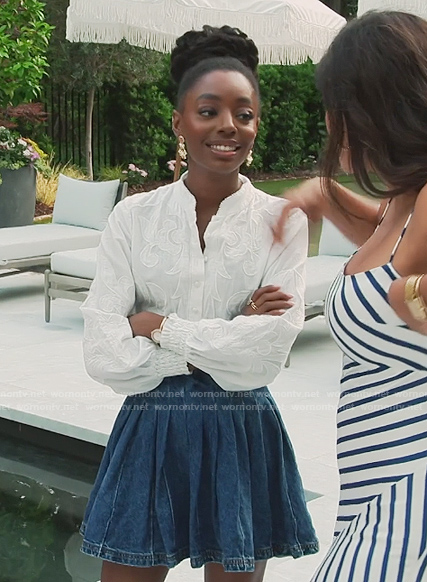 Venita's white embroidered blouse and denim mini skirt on Southern Charm