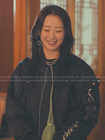 Yuri's black bomber jacket on XO Kitty
