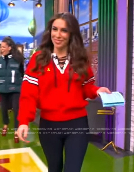 Alyssa's red lace-up detail sweater on The View