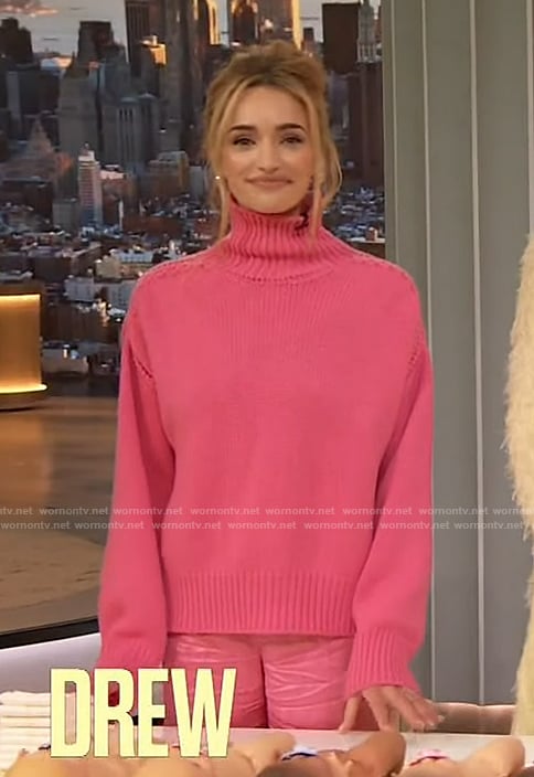 Brianne Howey's pink turtleneck sweater and pants on The Drew Barrymore Show