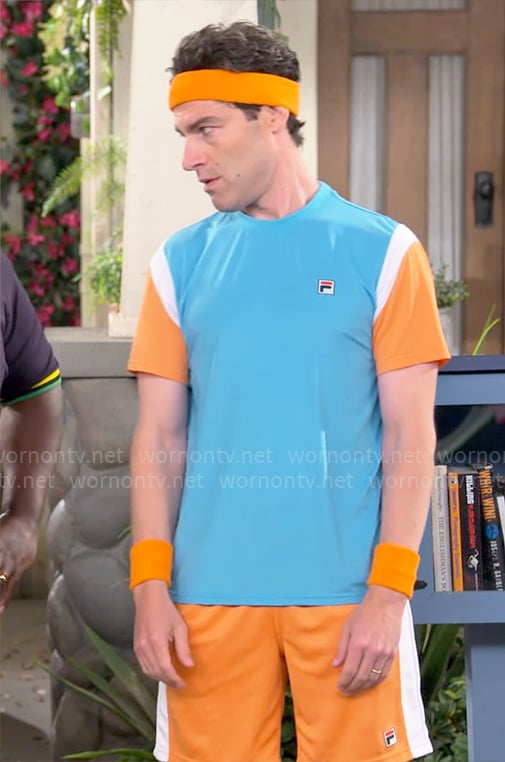 Dave's turquoise and orange colorblock t-shirt and shorts set on The Neighborhood