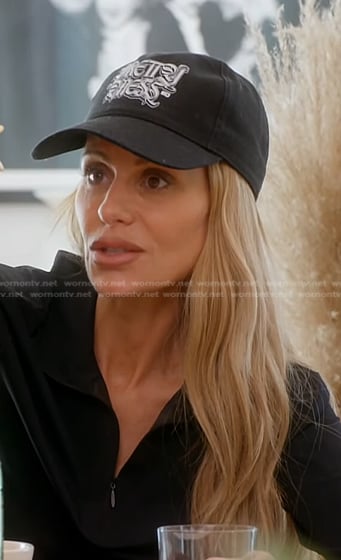 Dorit's black print baseball cap on The Real Housewives of Beverly Hills