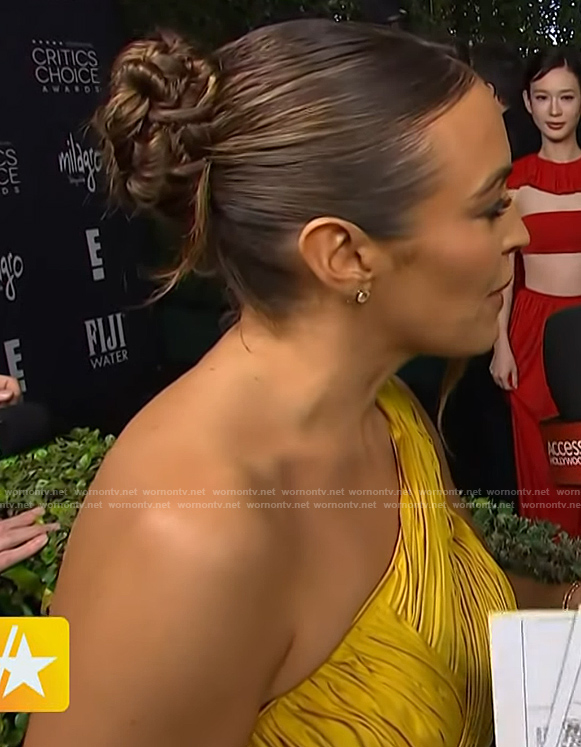 Emily Orozco's yellow gathered one shoulder gown on Access Hollywood