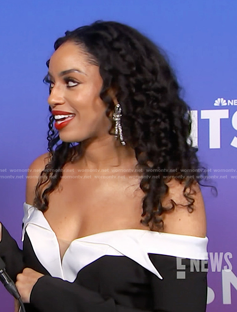Francesca Amiker's black contrast off shoulder dress on E! News
