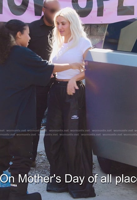 Kim's black leather pants on The Kardashians