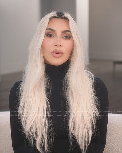 Kim's black confessional top on The Kardashians