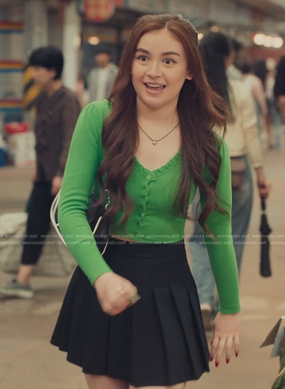Kitty's green cardigan and mini skirt on XO Kitty