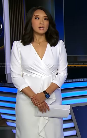 Nancy Chen's white ruffle front dress on CBS Evening News