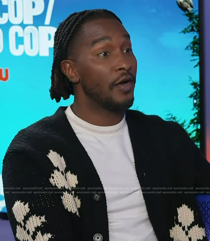 Scott's black floral cardigan on Access Hollywood