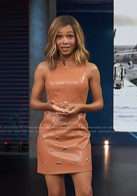 Zuri's brown leather grommet detail sleeveless dress on Access Hollywood