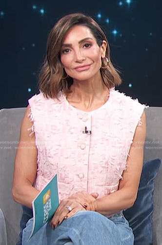 Courtney Lopez's pink sleeveless textured top on Access Hollywood