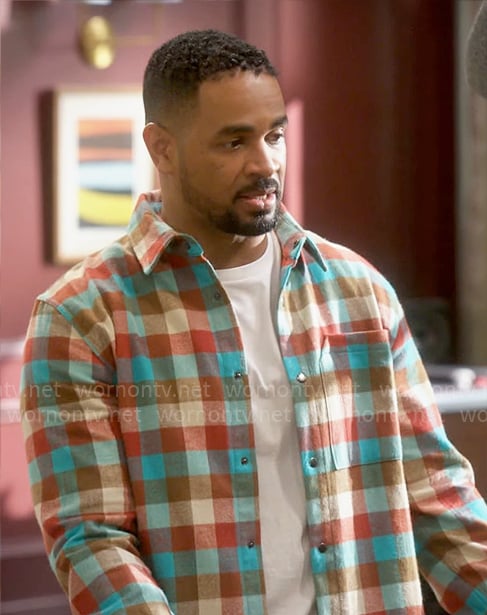 Junior's turquoise check shirt on Poppas House
