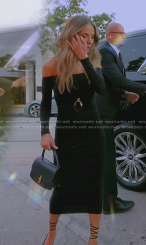 Dorit's black top handle leather bag on The Real Housewives of Beverly Hills
