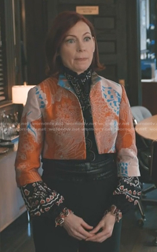 Elsbeth's orange floral cropped jacket on Elsbeth