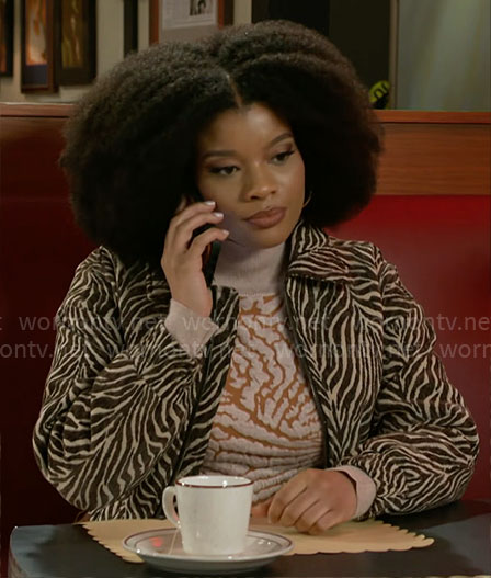 Eva's animal print sweater and jacket on Beyond the Gates