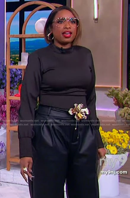 Jennifer's black mock neck top and pants on The Jennifer Hudson Show