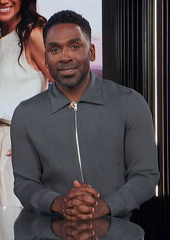 Justin's gray zip front shirt on E! News