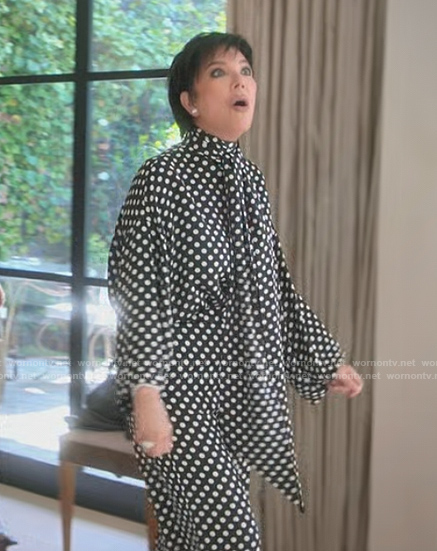 Kris's black polka dot tie neck blouse on The Kardashians
