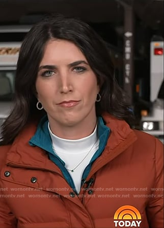 Liz's orange puffer jacket on Today